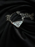 Prada Triangle Pendant Necklace.