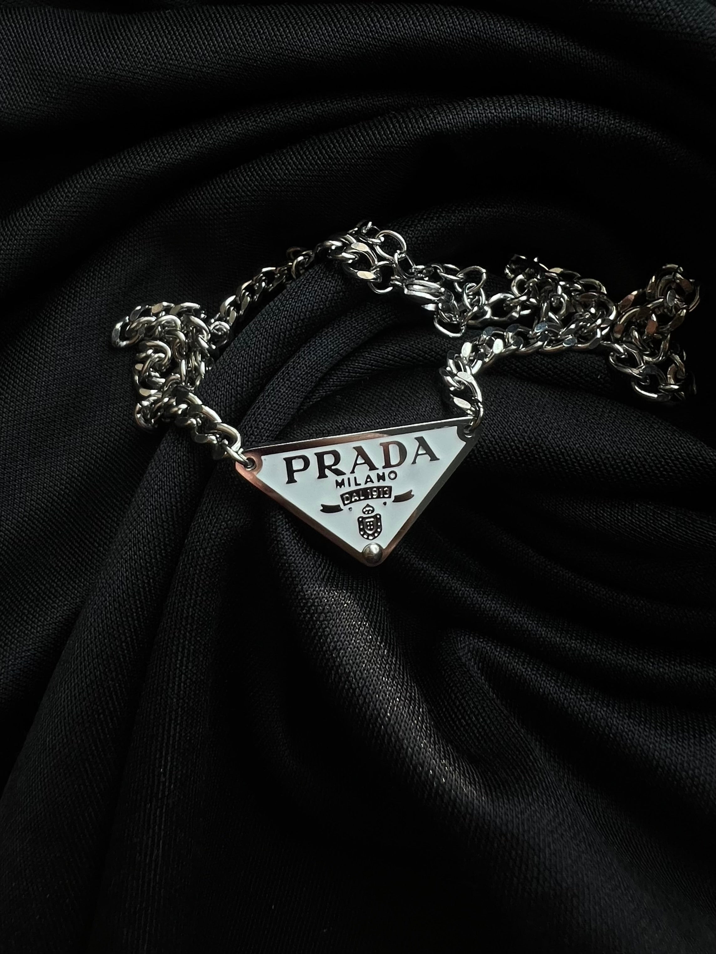 Prada Triangle Pendant Necklace.