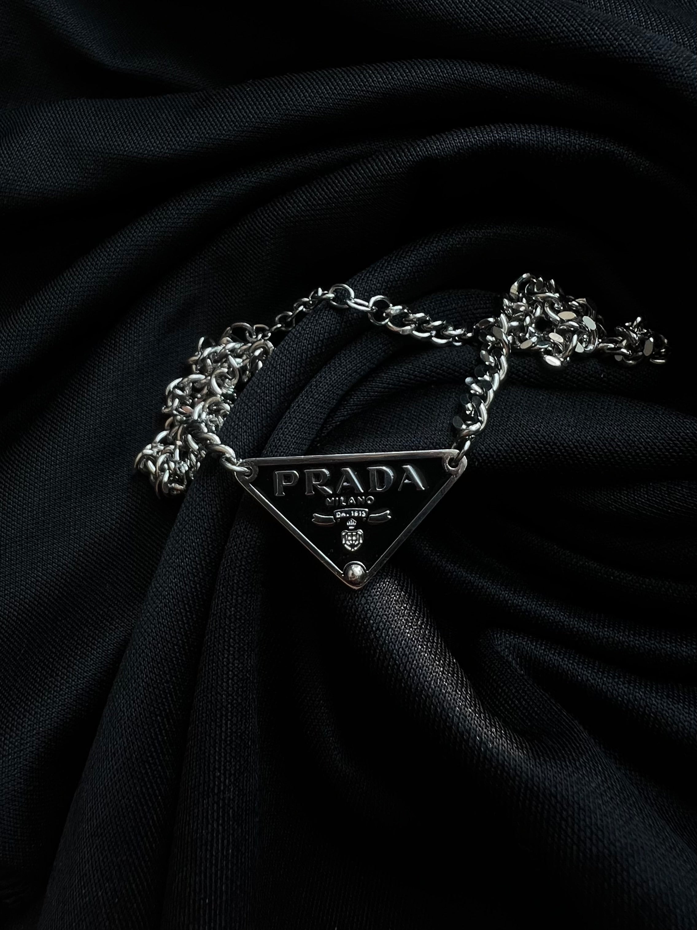 Prada Triangle Pendant Necklace.